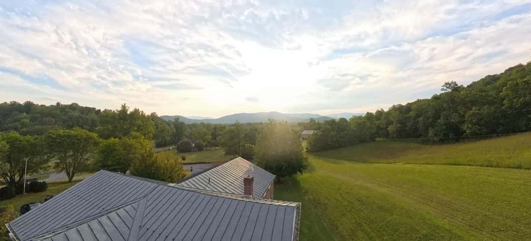 The view over the library roof at sunset, across the valley to the Blue Ridge.